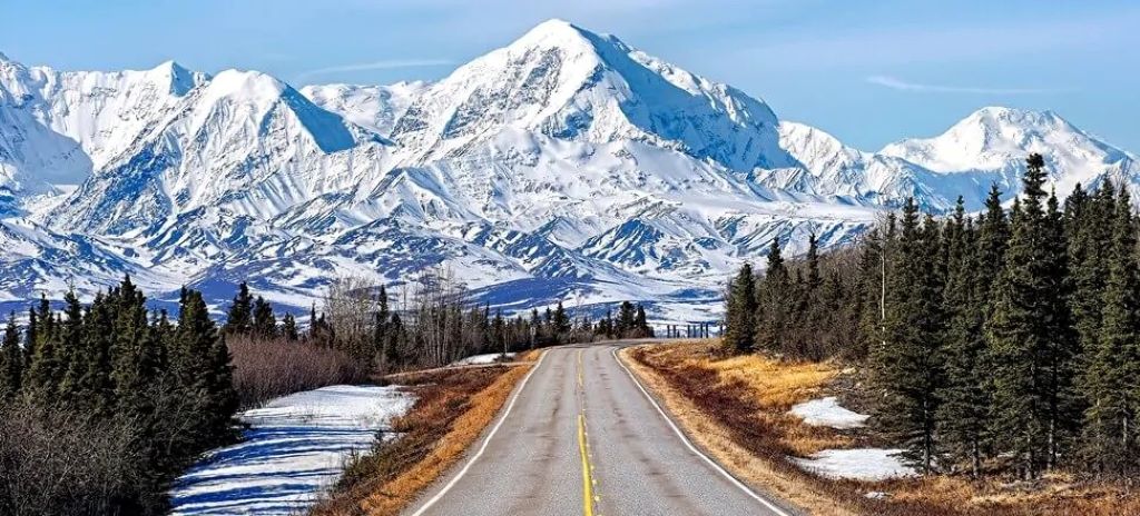 Individual staying active and positive in Alaska snowy environment with balanced lifestyle practices